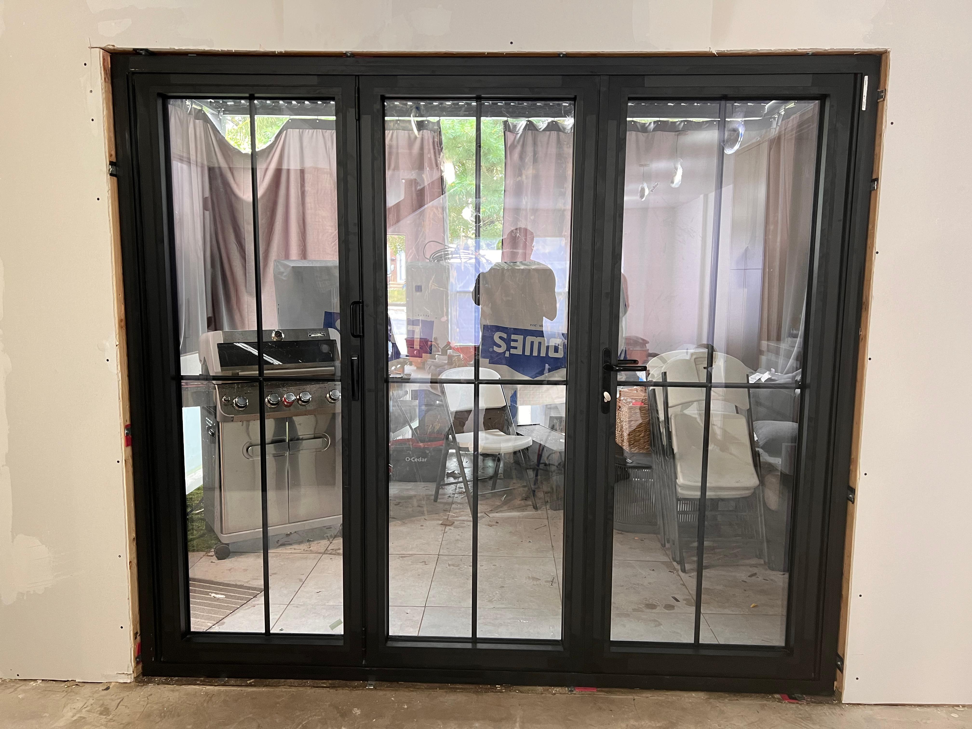 Modern Matte-Black Bi-Fold Patio Doors