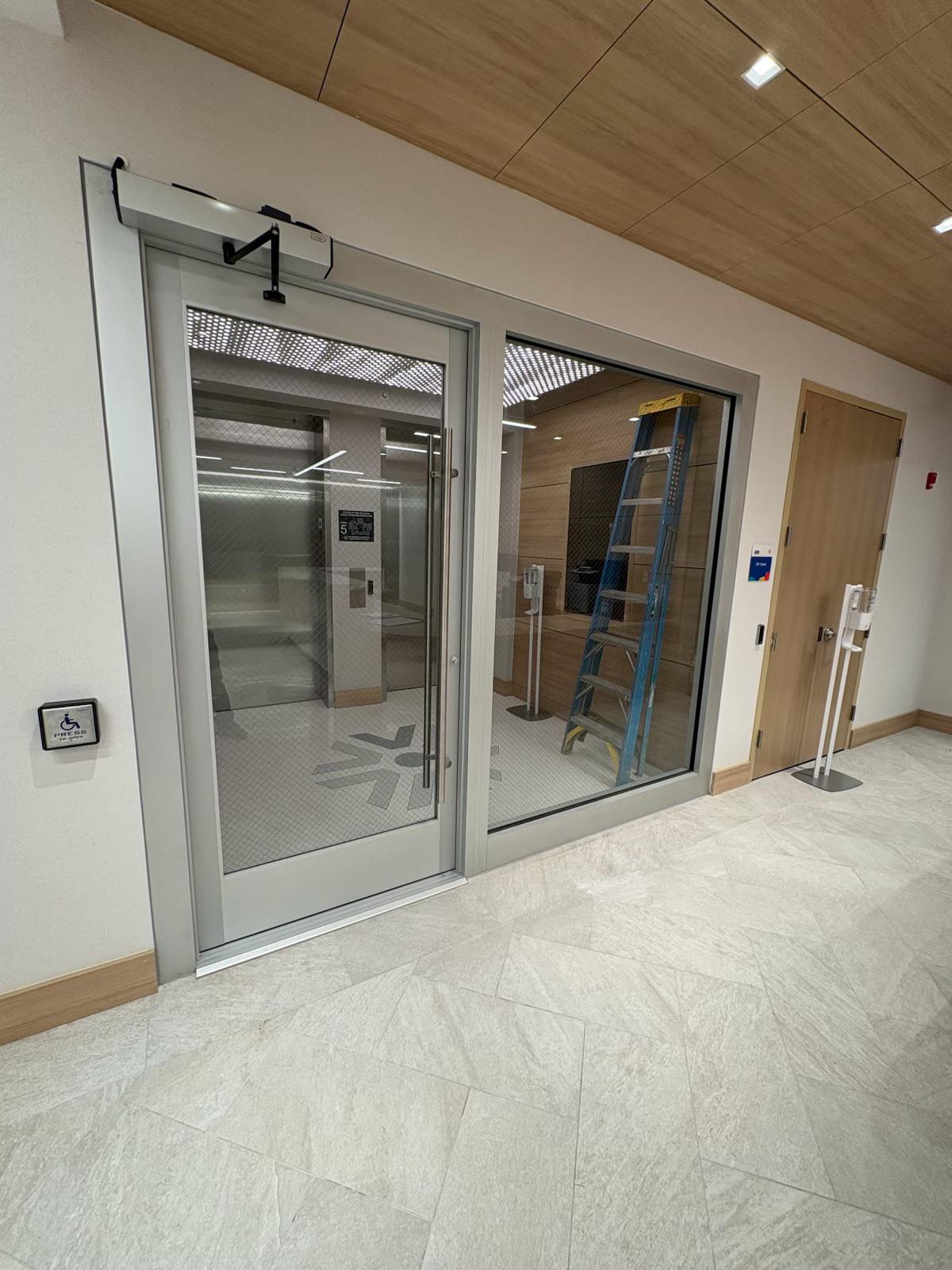 Full-Height Minimalist Glass Entry Door and Frame Assembly
